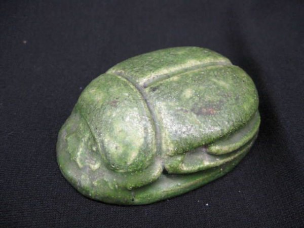 Grueby Art Pottery Scarab Paperweight, Arts & Craft: era, green glaze, introduced at the 1904 St. Louis World's Fair by this famous Boston firm, 4" x 2 3/4", part of original label, excellent.