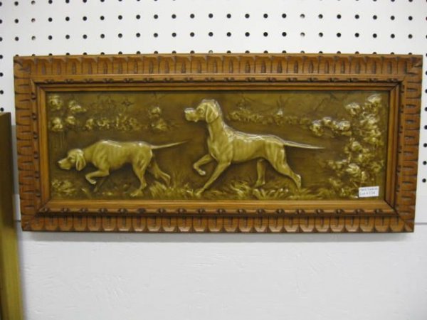 Victorian Art Pottery Tile Plaque of Dogs, fine : raised decor, approx. 6" x 18", in fine carved oak frame.