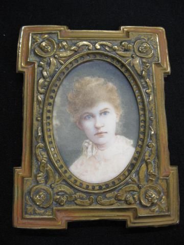 Miniature Painting on Ivory of Young Lady, : red hair, oval, 2 1/4" x 3 1/4", brass frame, 19th century.
