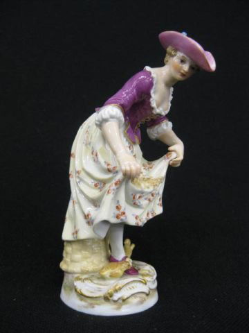 Meissen Porcelain Figurine of Lady Feeding birds,: seeds in her dress, 19th century, 5", crossed swords mark, no damage found.