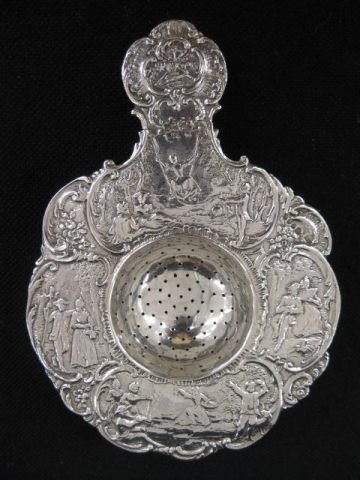Victorian Sterling Silver Tea Strainer, elaborate: garden scenes, hallmarked, 4" diameter, 5 1/2" long.