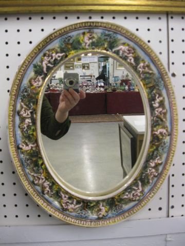 Capodimonte Porcelain Framed Mirror, : elaborate cherub decor, oval, 14" x 17".