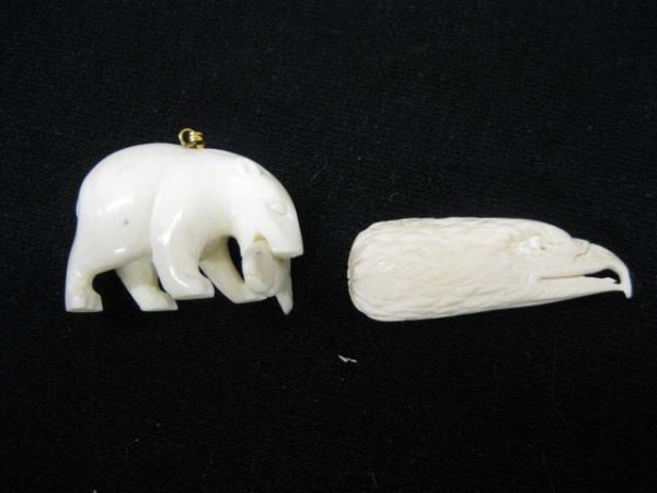2 pcs. Carved Ivory; polar bear with fish : and eagle's head, 1 1/4", excellent.