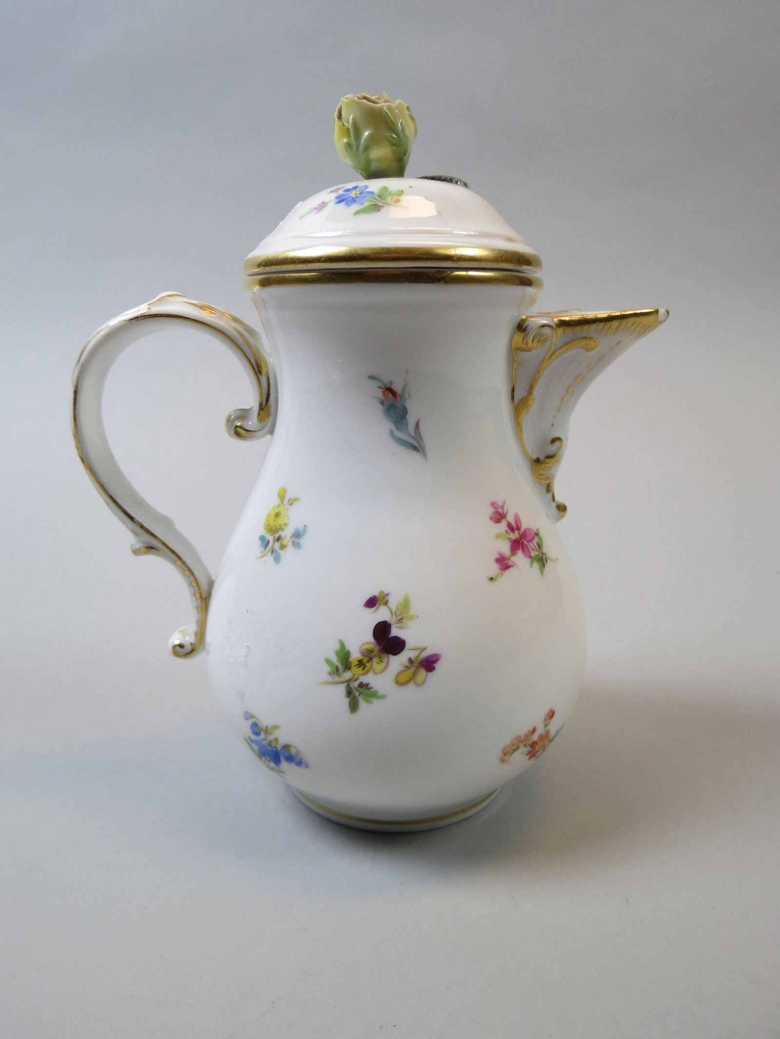 Meissen Porcelain Hot Water Pot: Individual size, hand painted floral sprays, yellow rose finial, 5 3/4", crossed swords mark.