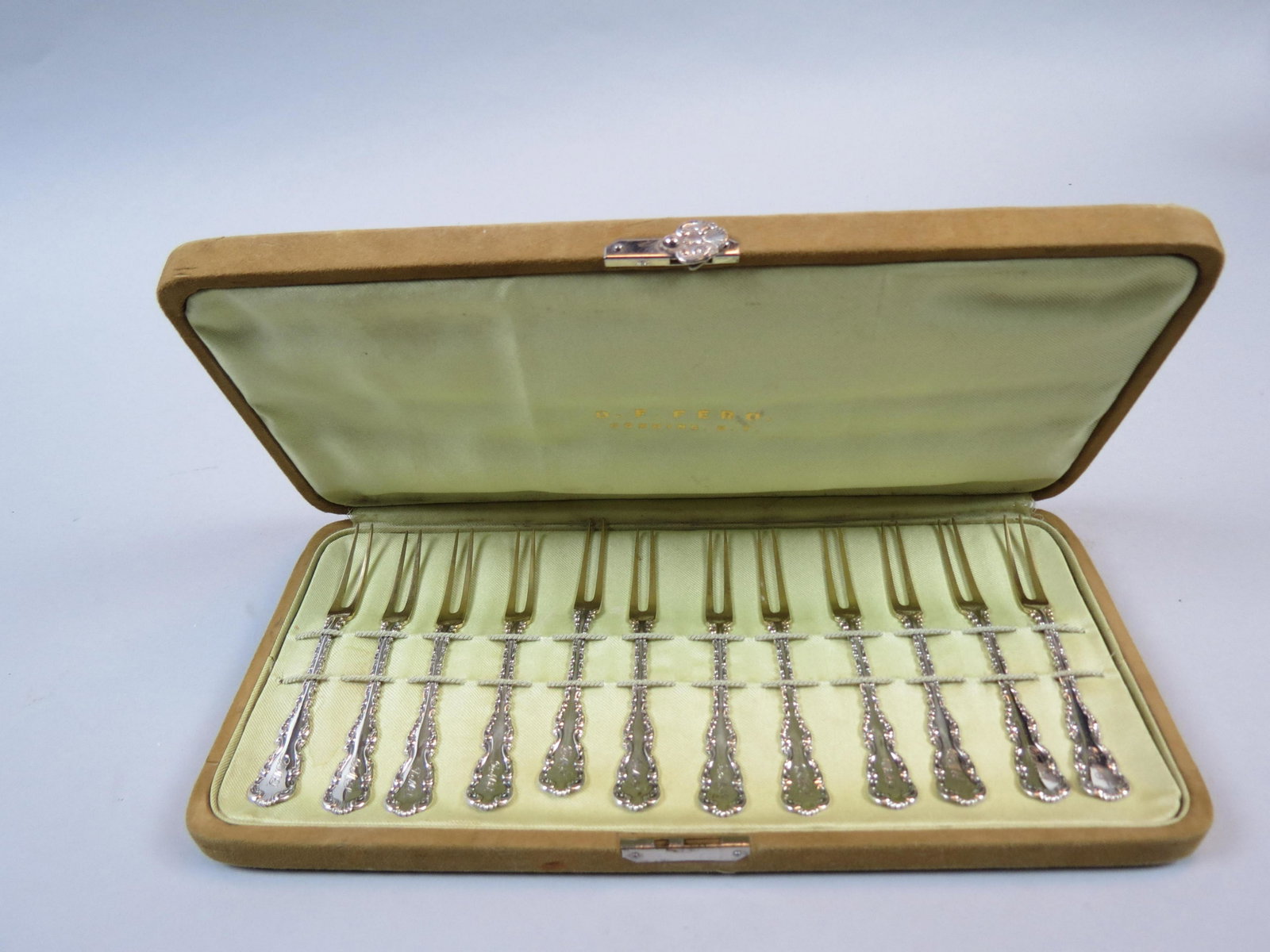 12 Whiting " Louis XV" Sterling Strawberry Forks: Gold tines, fancy monogram, 4 1/2" long, in box, excellent.