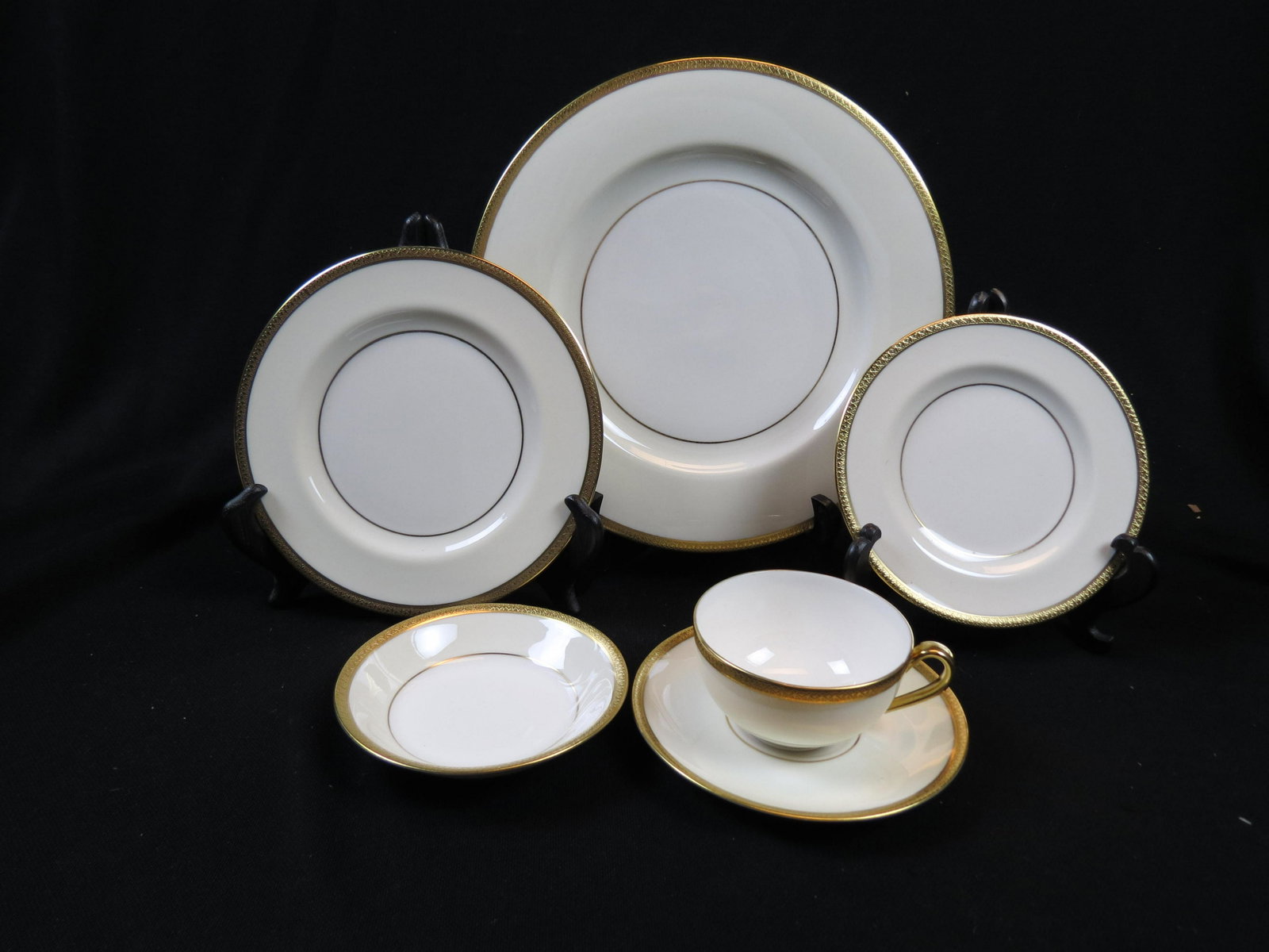 79 pc. Theodore Haviland Gold Rim China Service: For twelve with servers, gold encrusted design, excellent.