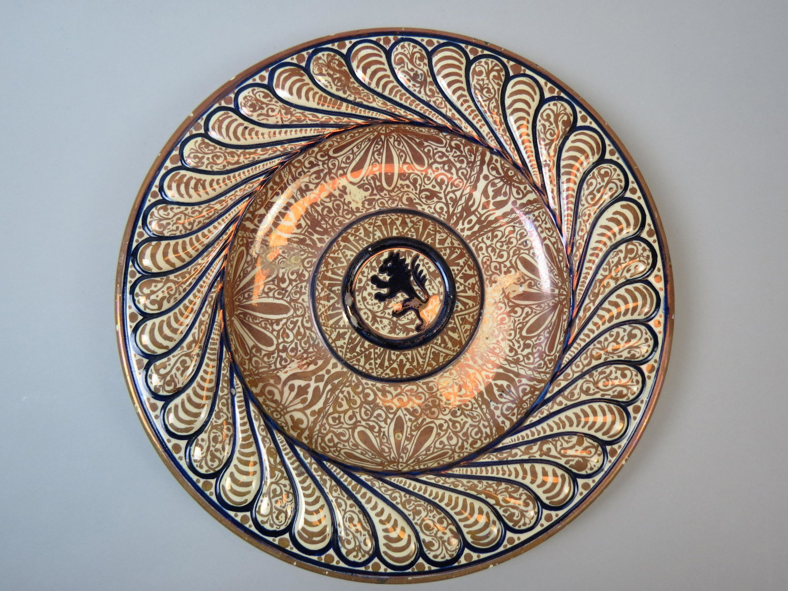 Moorish Style Pottery Charger: Luster glaze, lion in center, 16" diameter, excellent.