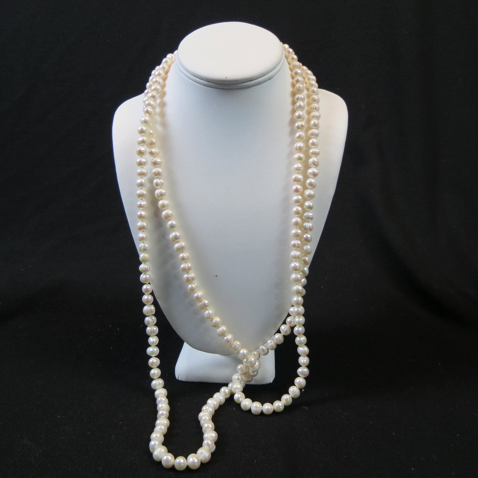 Pearl Necklace: Acorn shape pearls, 9 to 9.5 Mm, 64" long, nice luster.