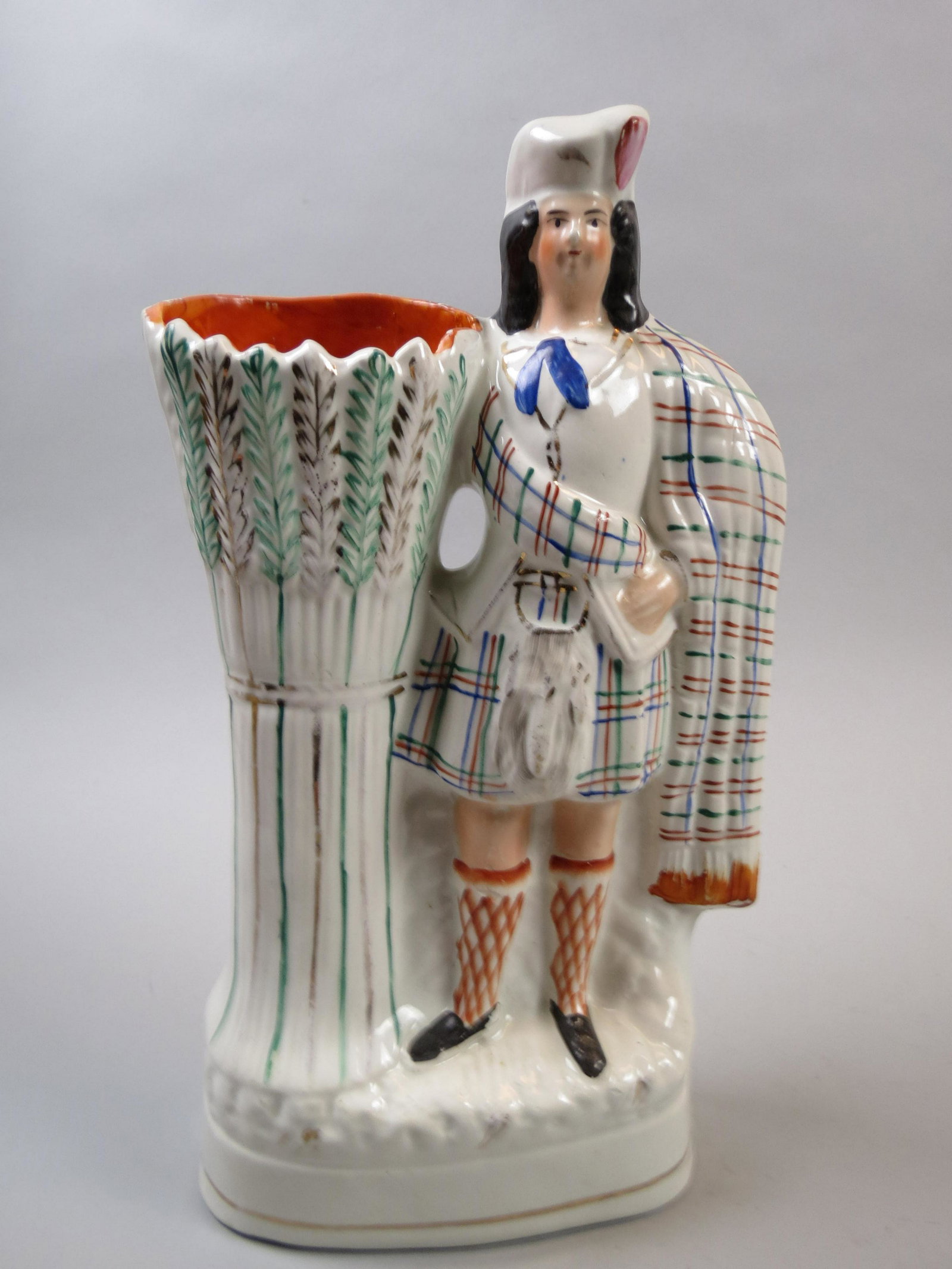 Staffordshire Pottery Figural Vase: Staffordshire Pottery Figural Vase, Scottish man and sheath of wheat, 13 1/2", 19th century.