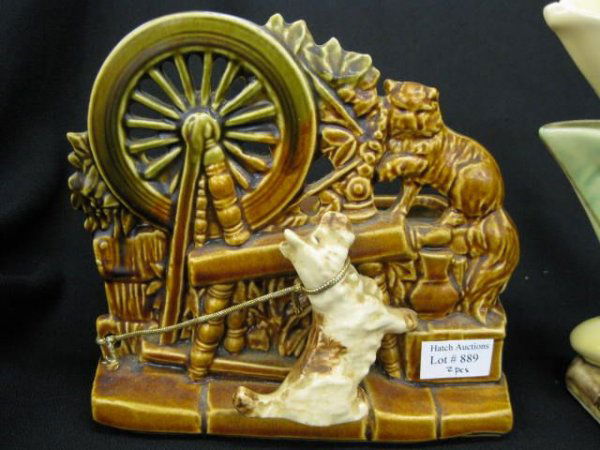 2 pcs. McCoy Pottery; dog & cat at spinning wheel: dog & cat at spinning wheel planter and a double tulip vase, tallest is 8".
