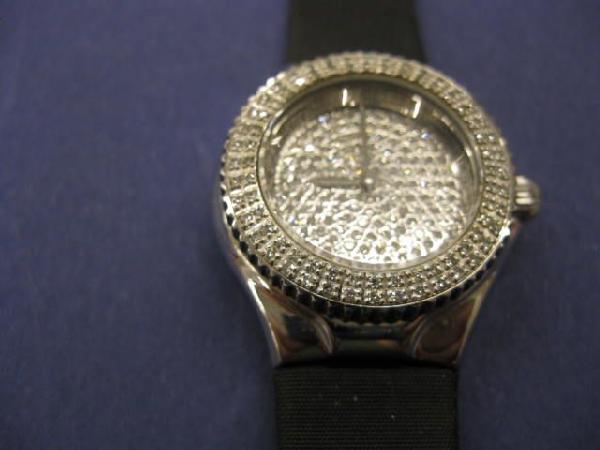 TechnoMarine Diamond Wristwatch,: pave set dial and bezel, 30 mm case, seldon worn