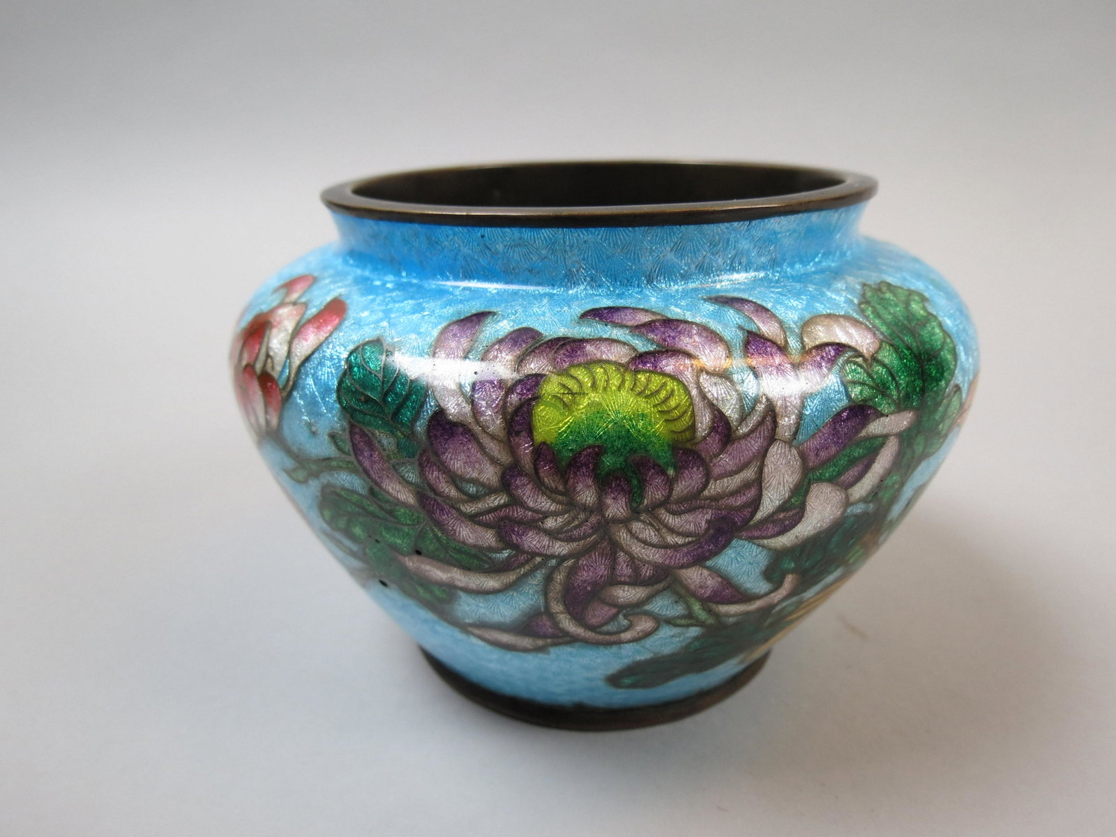 Japanese Ginbari Cloisonne Vase, Meiji period,: floral on blue and silver foil background, 5" diameter, 3 1/4" tall, silver wirework, no loss.