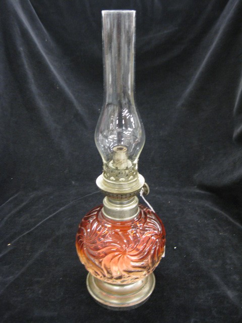 Baccarat Miniature Oil Lamp,: Rose tiente, pinwheel design, 14" overall, heat line in base.