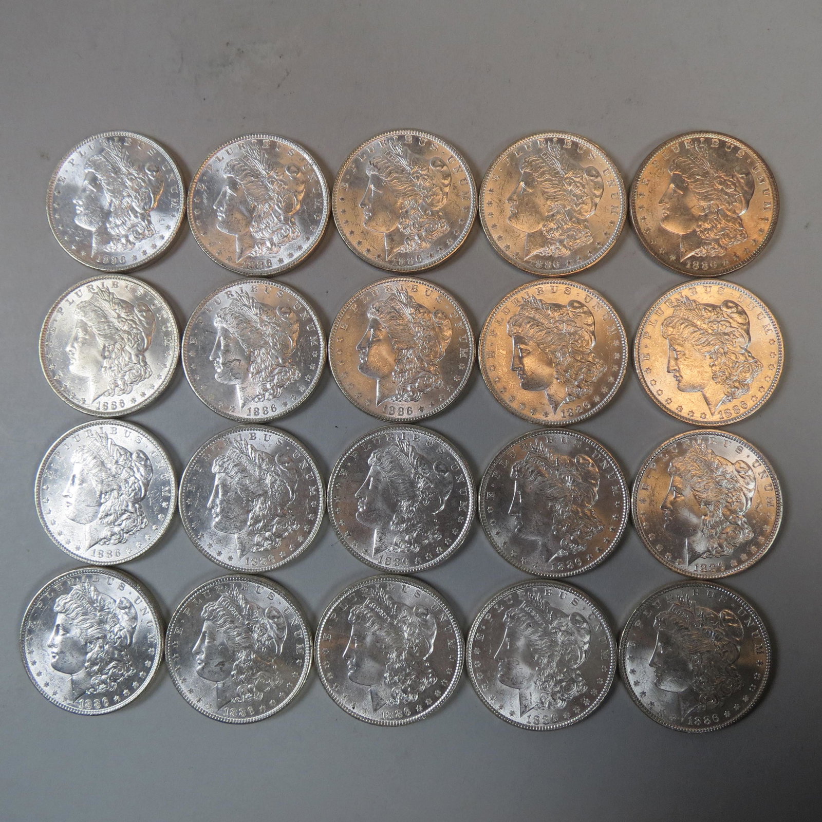 20 1886 Morgan Silver Dollars, uncirculated, (1 of 8)