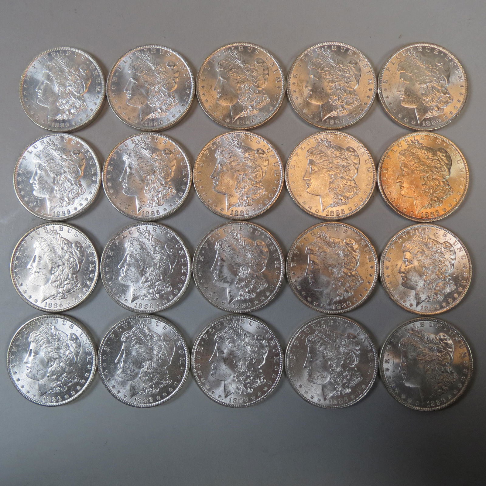 20 1886 Morgan Silver Dollars, uncirculated, (1 of 8)