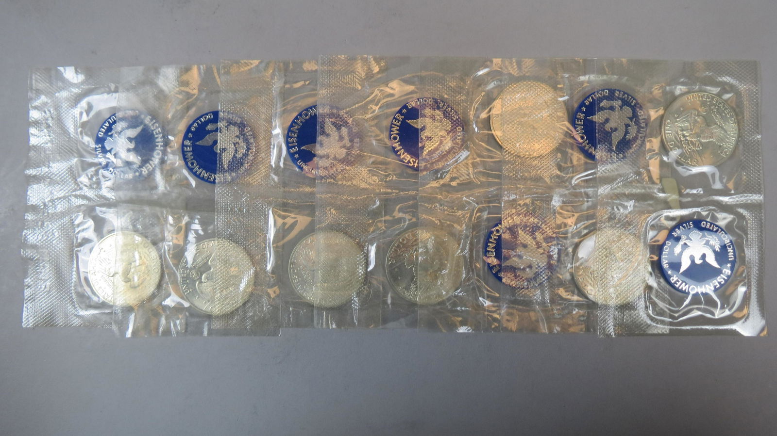 7 1971 Eisenhower Silver Dollars 40% Uncirculated, (1 of 4)