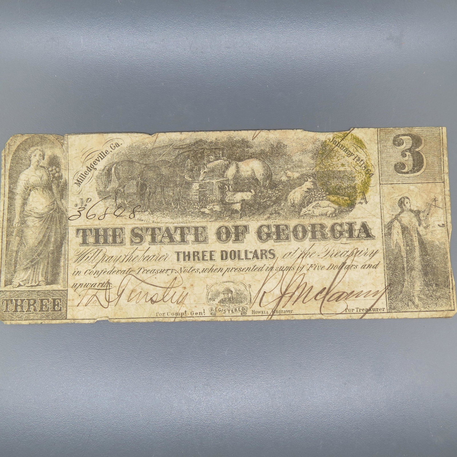 1864 $3.00 Confederate Note Milledgeville, Ga,: January 1, 1864, serial #36848, signed, a scarcer denomination Civil War note..............The Civil War and Its AftermathOn January 19, 1861, Georgia convention delegates passed the Ordinance of Sece