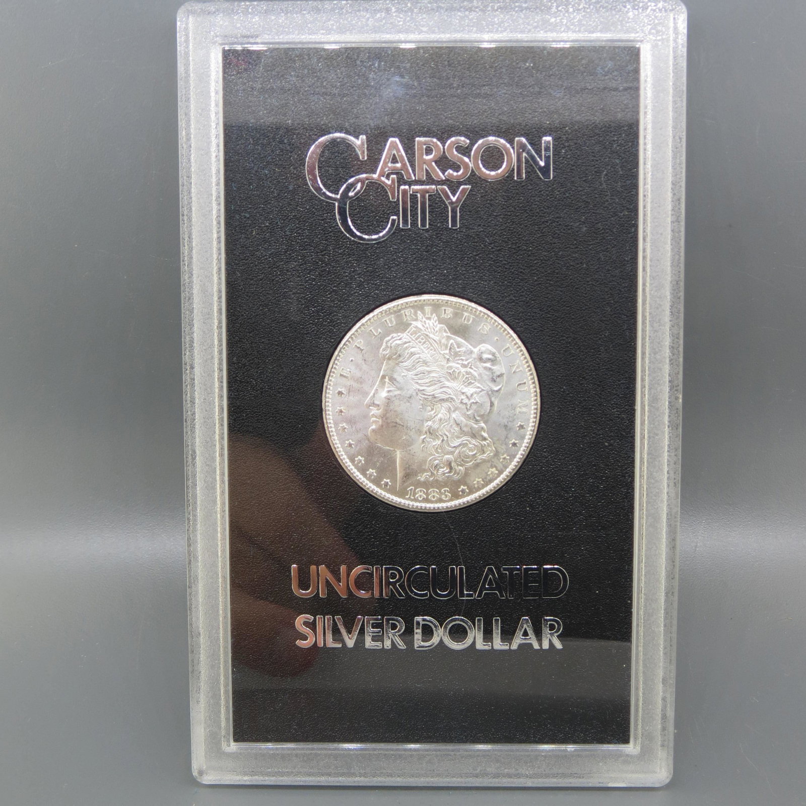 1883-CC Morgan Silver Dollar, GSA, uncirculated, (1 of 5)