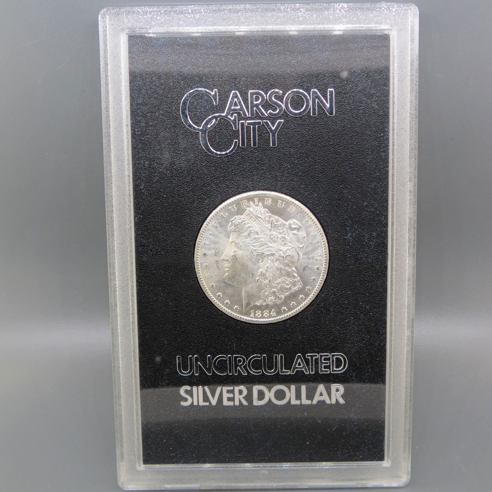 1884-CC Morgan Silver Dollar, GSA, uncirculated, (1 of 5)