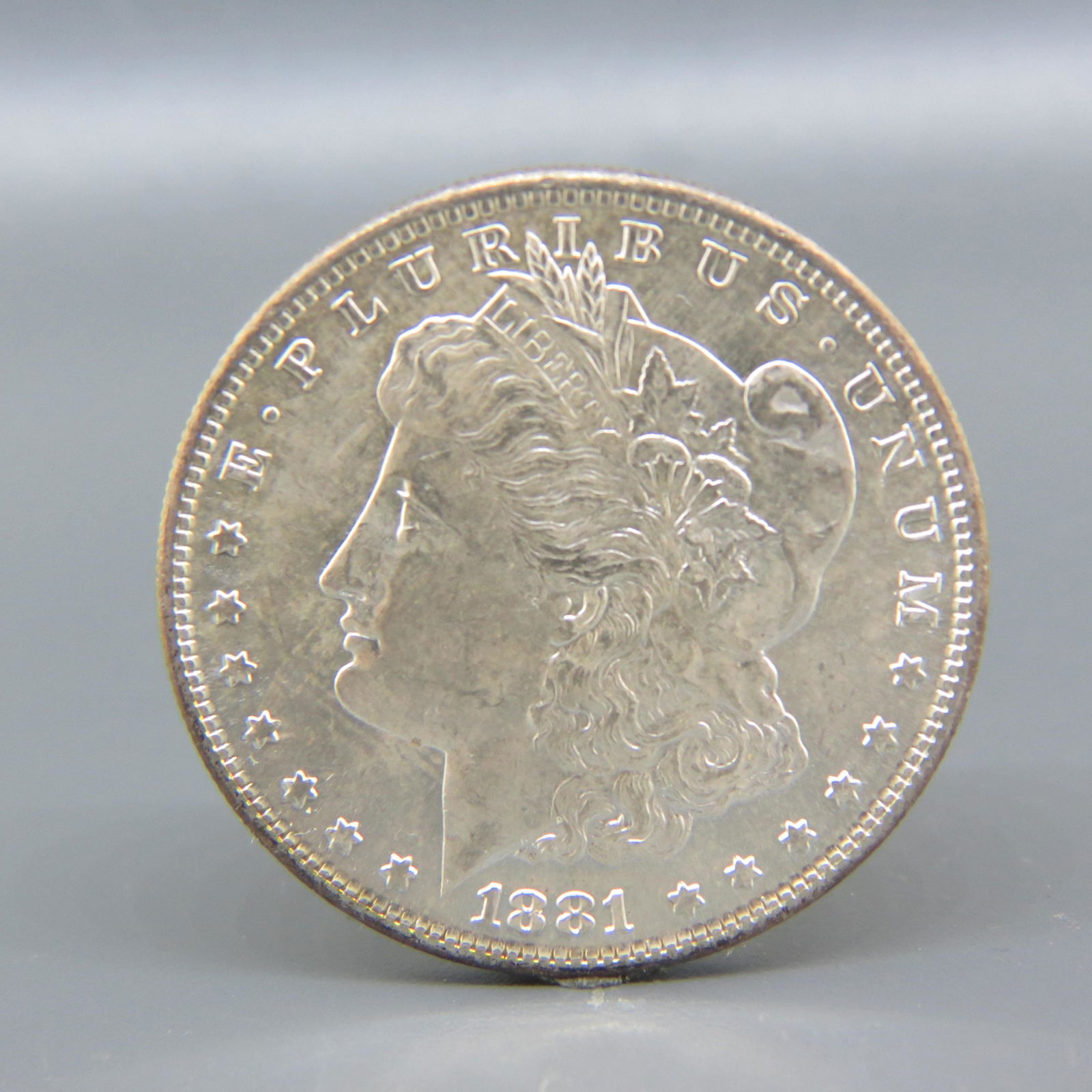 1881-S Morgan Silver Dollar, uncirculated, (1 of 2)