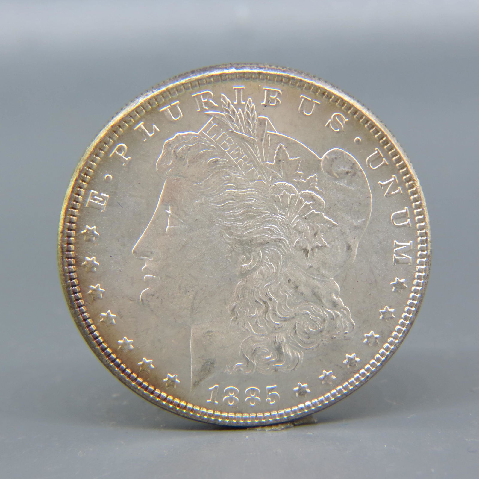 1885 Morgan Silver Dollar, uncirculated, (1 of 2)