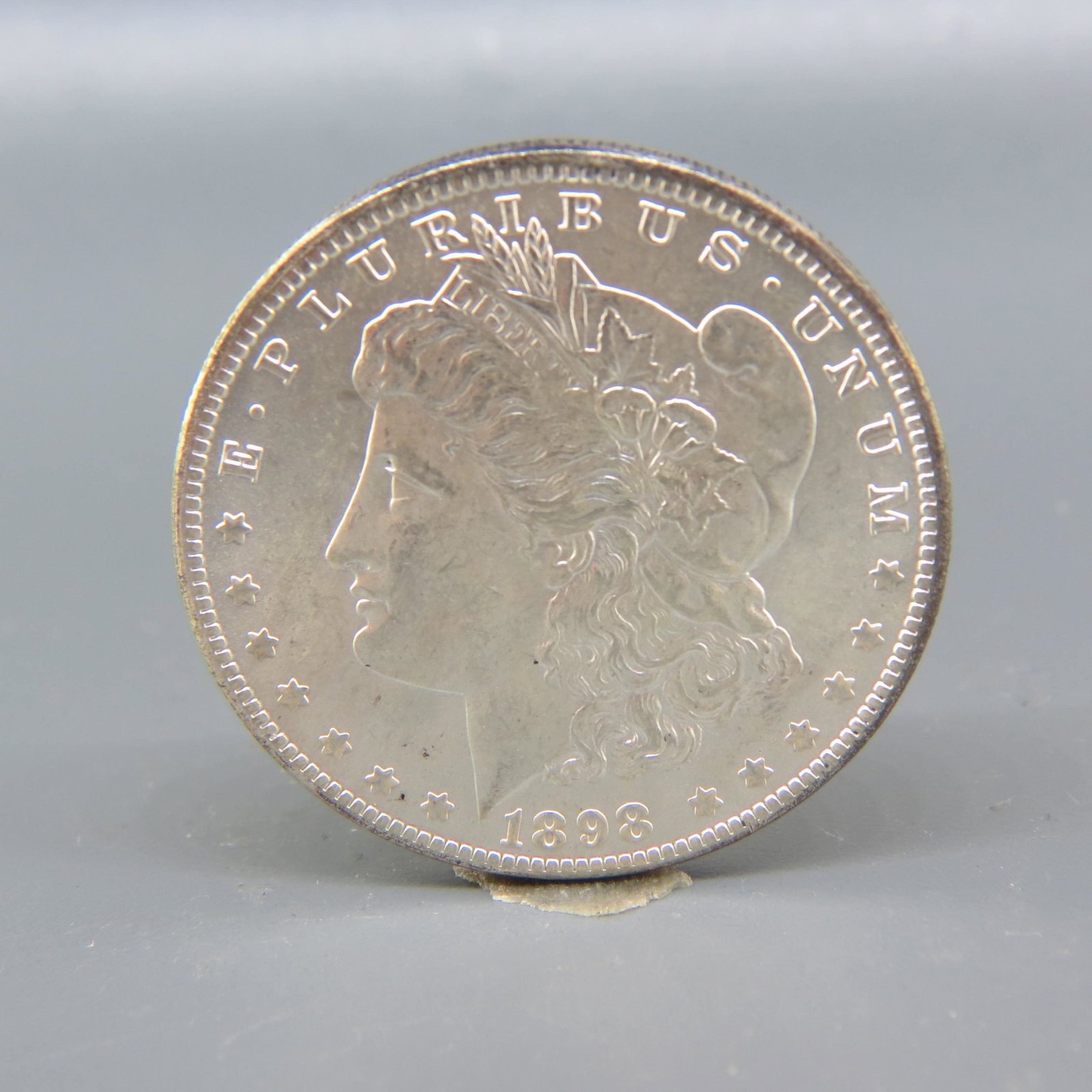 1898-O Morgan Silver Dollar, uncirculated, (1 of 2)
