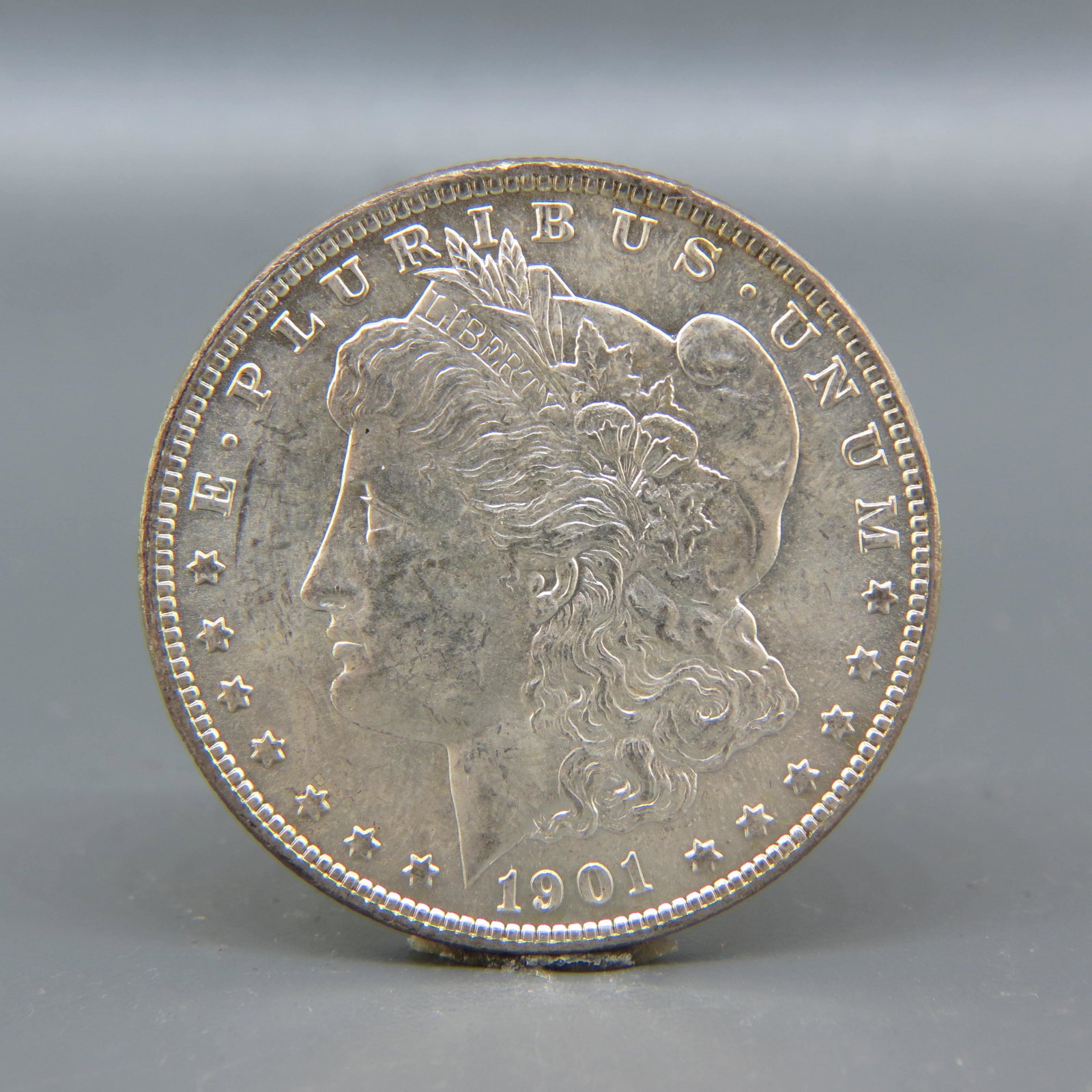 1901-O Morgan Silver Dollar, uncirculated, (1 of 2)