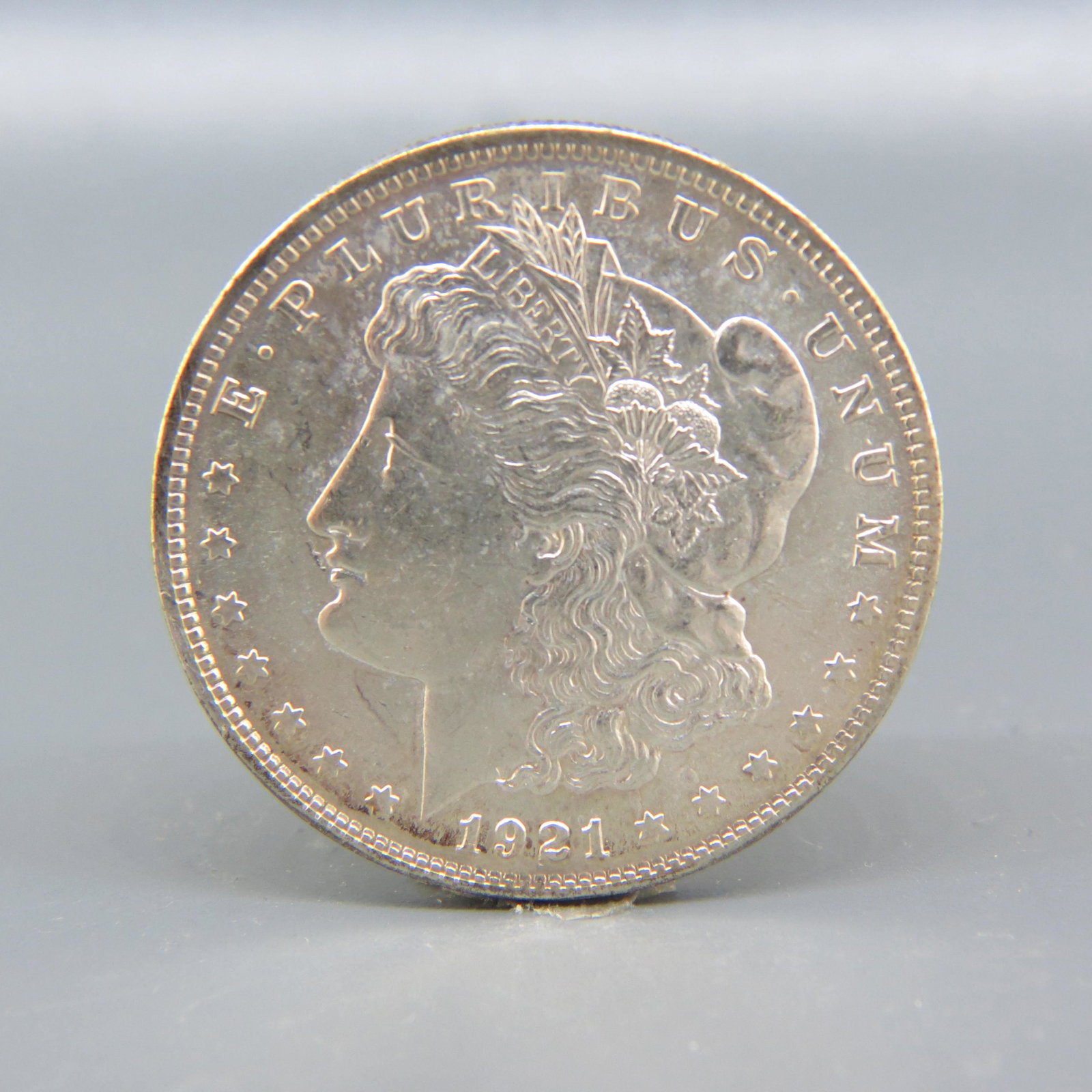 1921 Morgan Silver Dollar, uncirculated, (1 of 2)