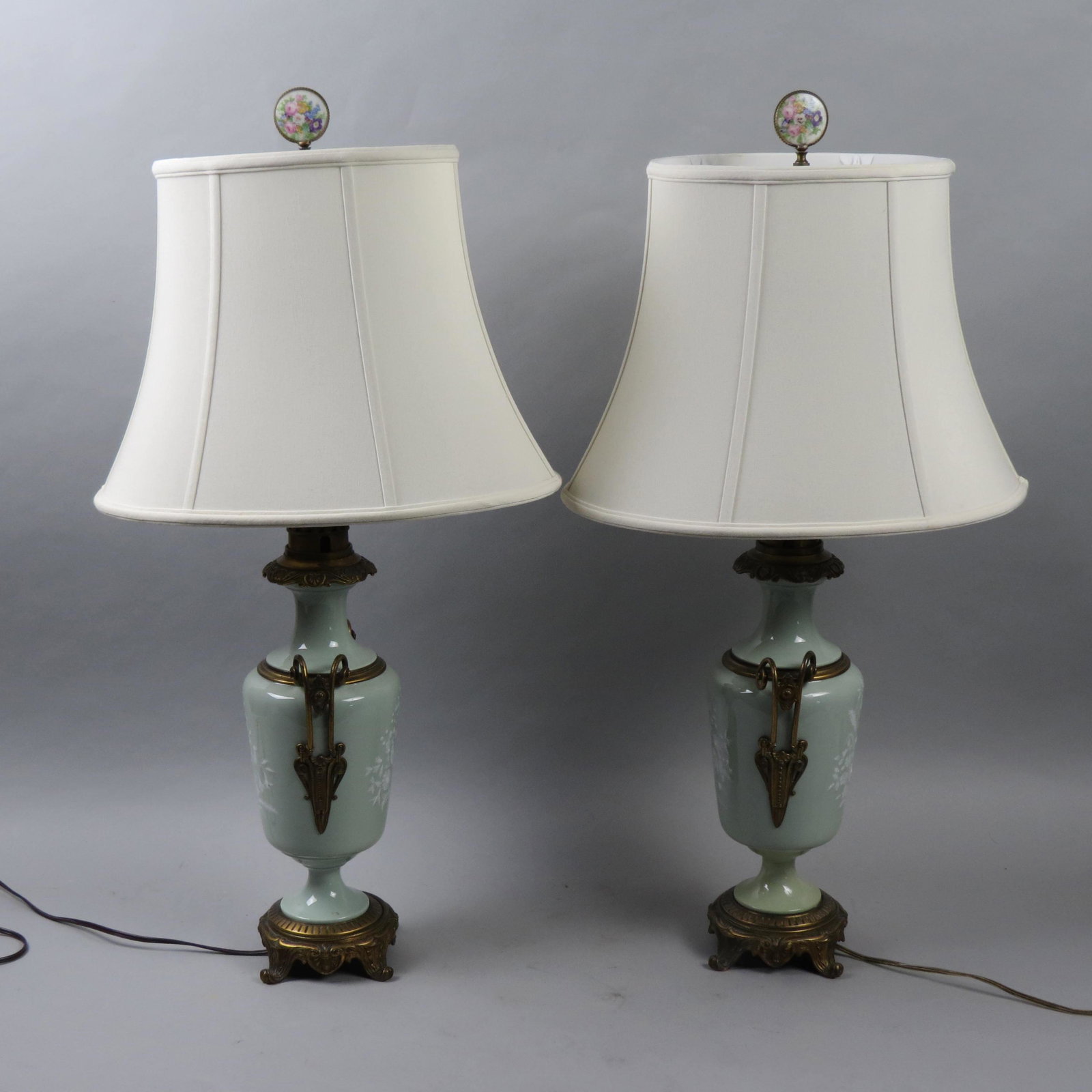 Pair of Pate-Sur-Pate Porcelain Table Lamps: White bird and floral design on pale green field, bronzed footed bases and handles, attributed to Minton, approx. 18 body, excellent.