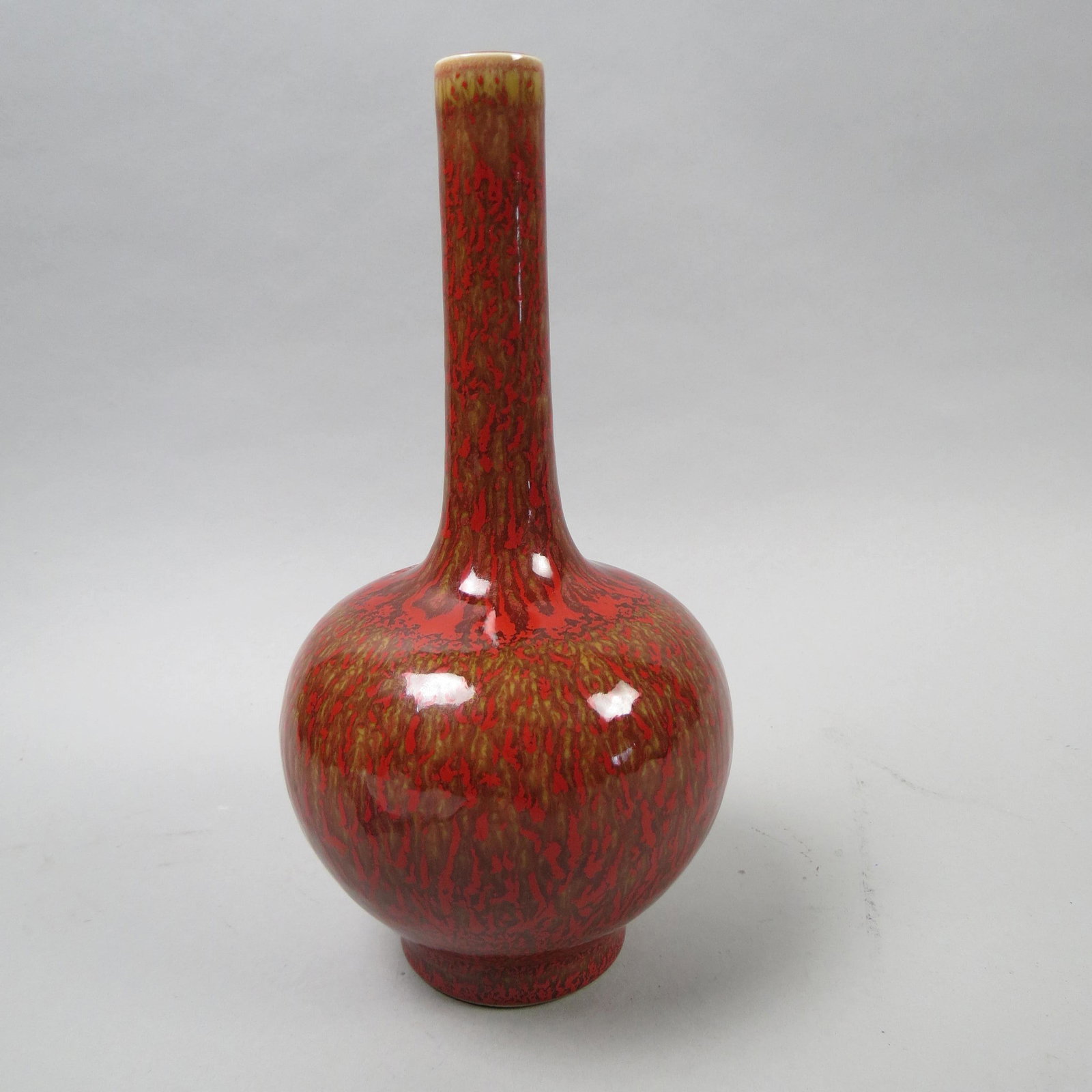 Chinese Porcelain Red & Brown Vase, signed: A mottled style glaze, stick neck, 10 1/2, excellent.