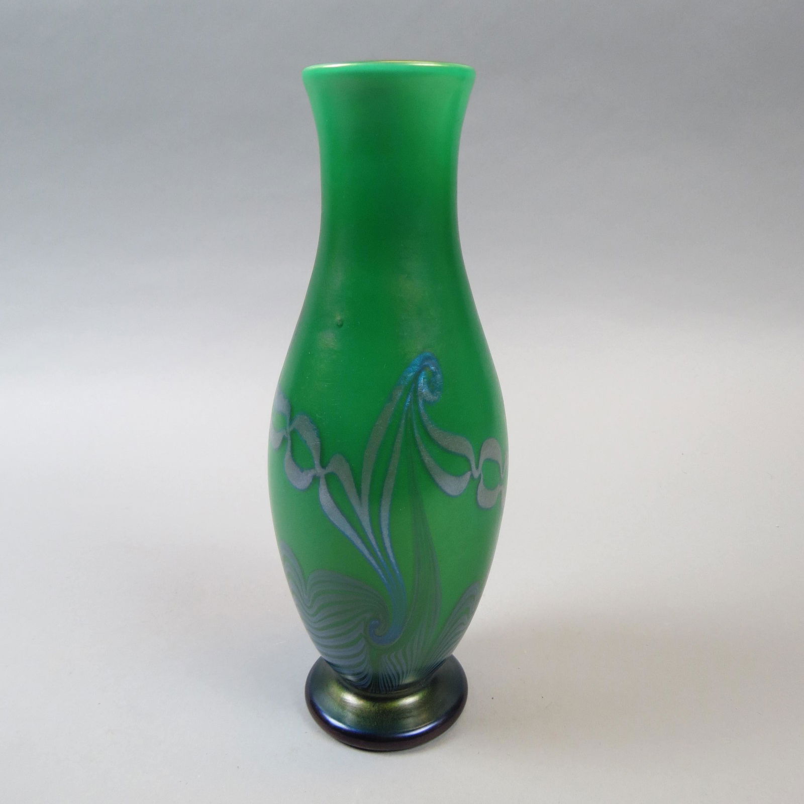 Studio Art Glass Vase: Iridescent silver trailing on green field, unsigned, possibly Orient & Flume or Lundberg Studios, 11 excellent.