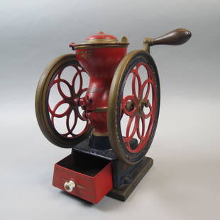 1873 Enterprise Coffee Mill: Side wheel cranks, fill top, lower drawer, 12 3/4 tall.