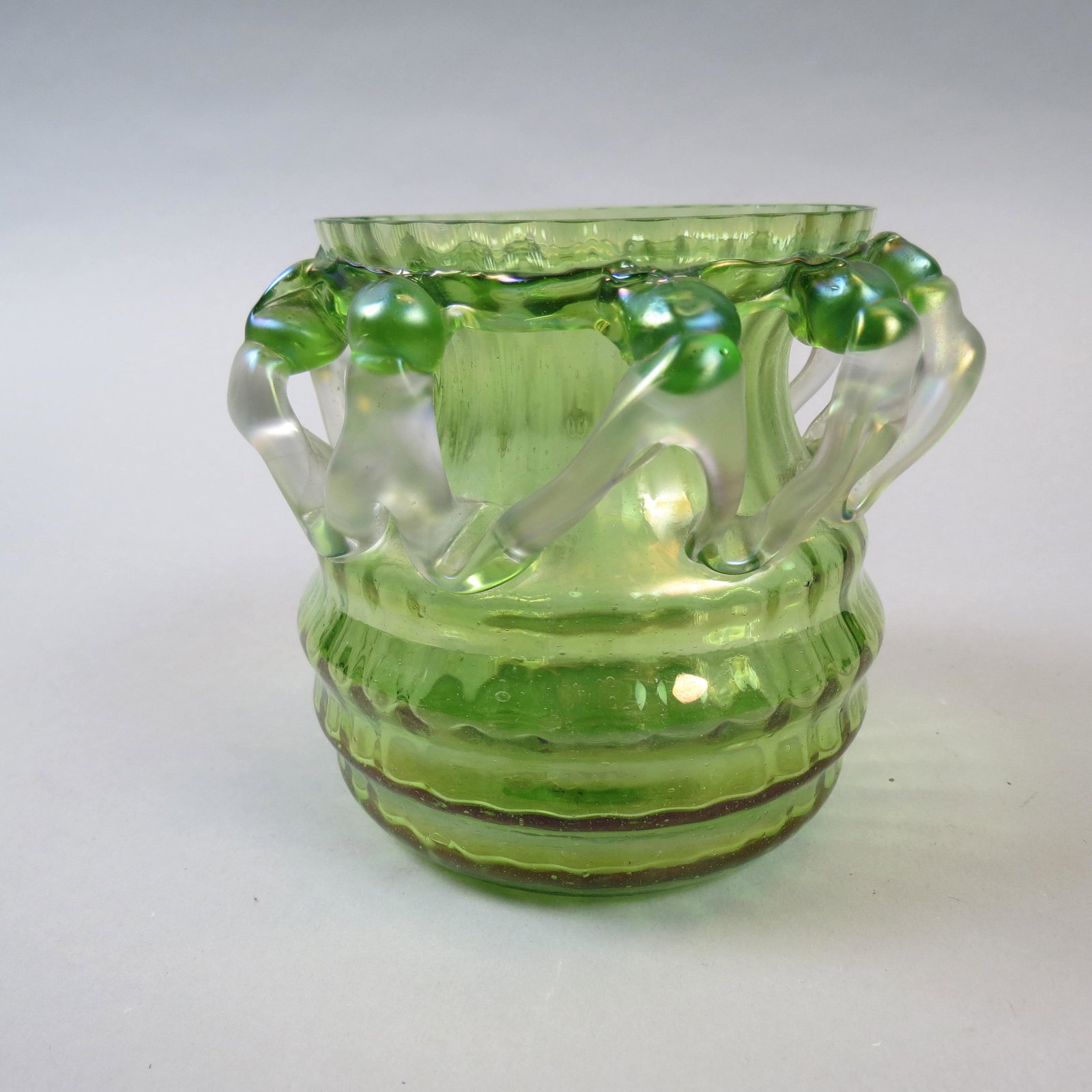 Austrian Art Glass Vase: Loetz type, green ribed body with clear satin applied trim, 5 diameter, 4 1/2" tall, circa 1890, excellent.