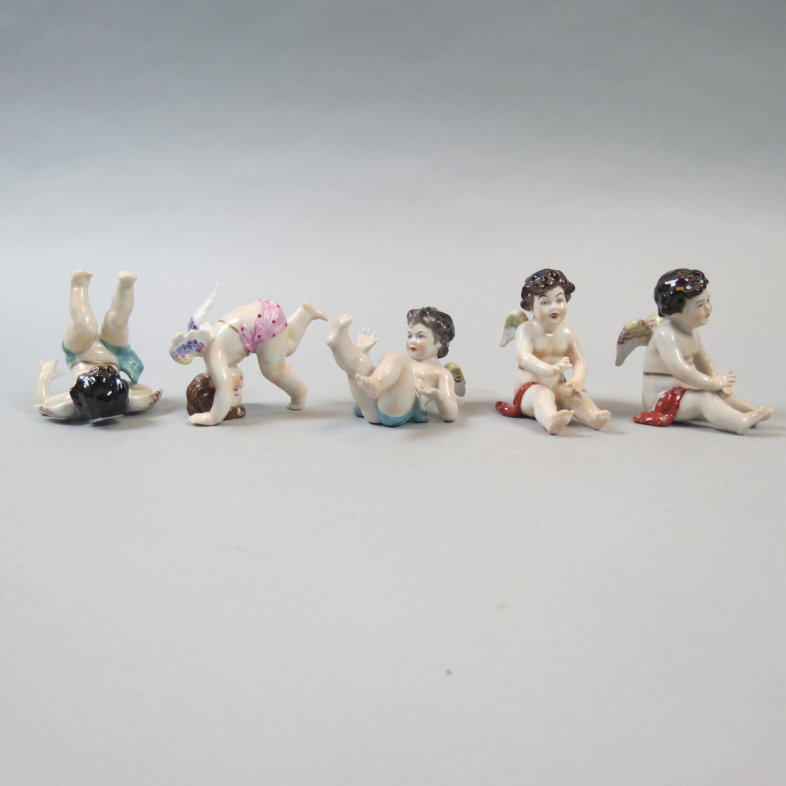 5 Dresden Porcelain Tumbling Cherubs" Figurines," (1 of 7)