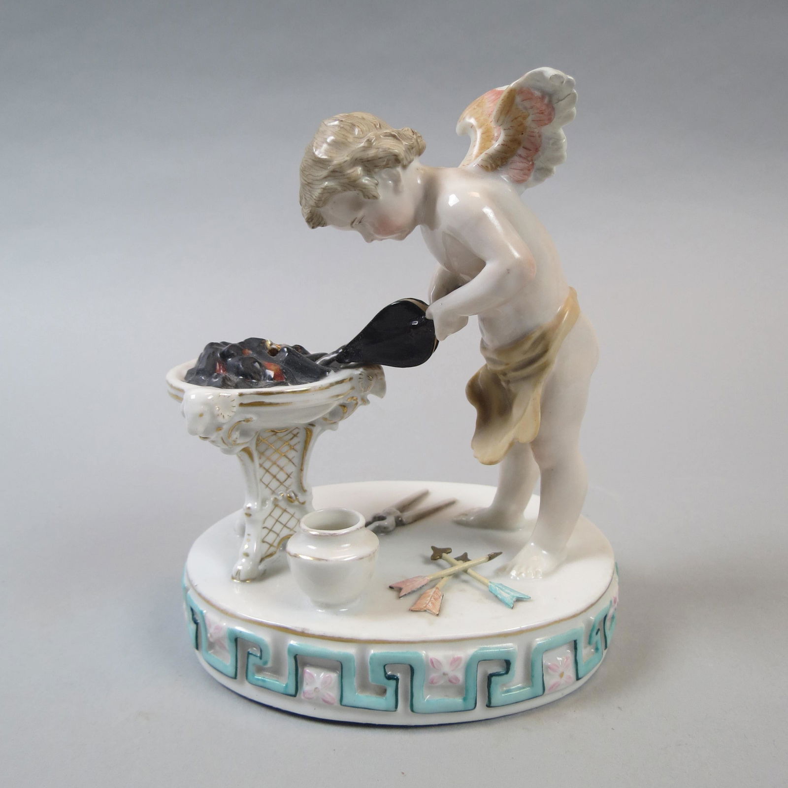 German Porcelain Figurine of Cupid Preparing"," (1 of 6)