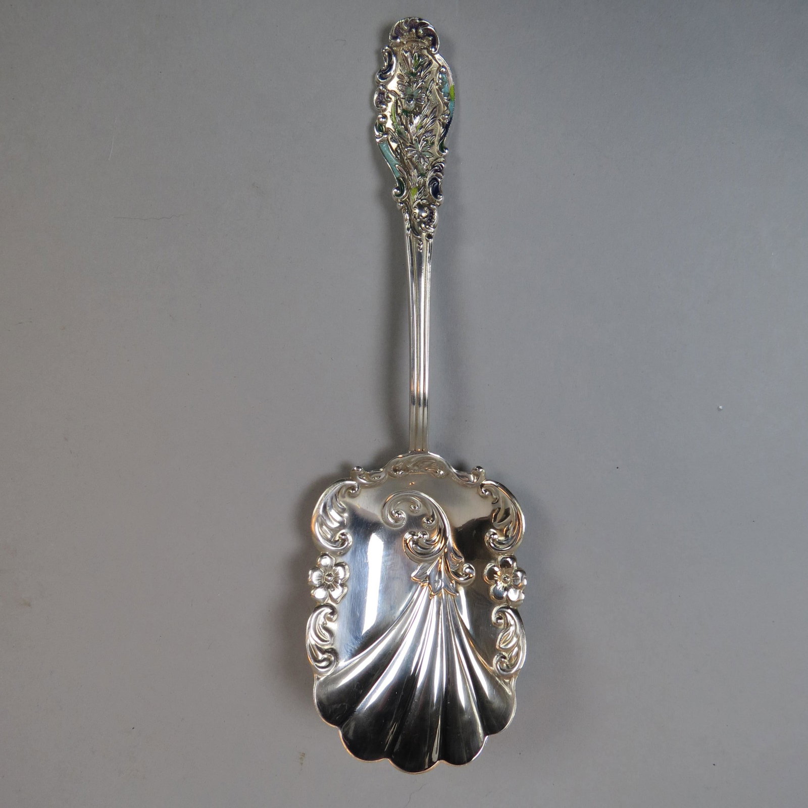 Victorian Enameled Sterling Berry/Casserole Spoon: Multi-color floral handle, elaborate bowl, 8 1/2, monogram on back, excellent, 71 grams.