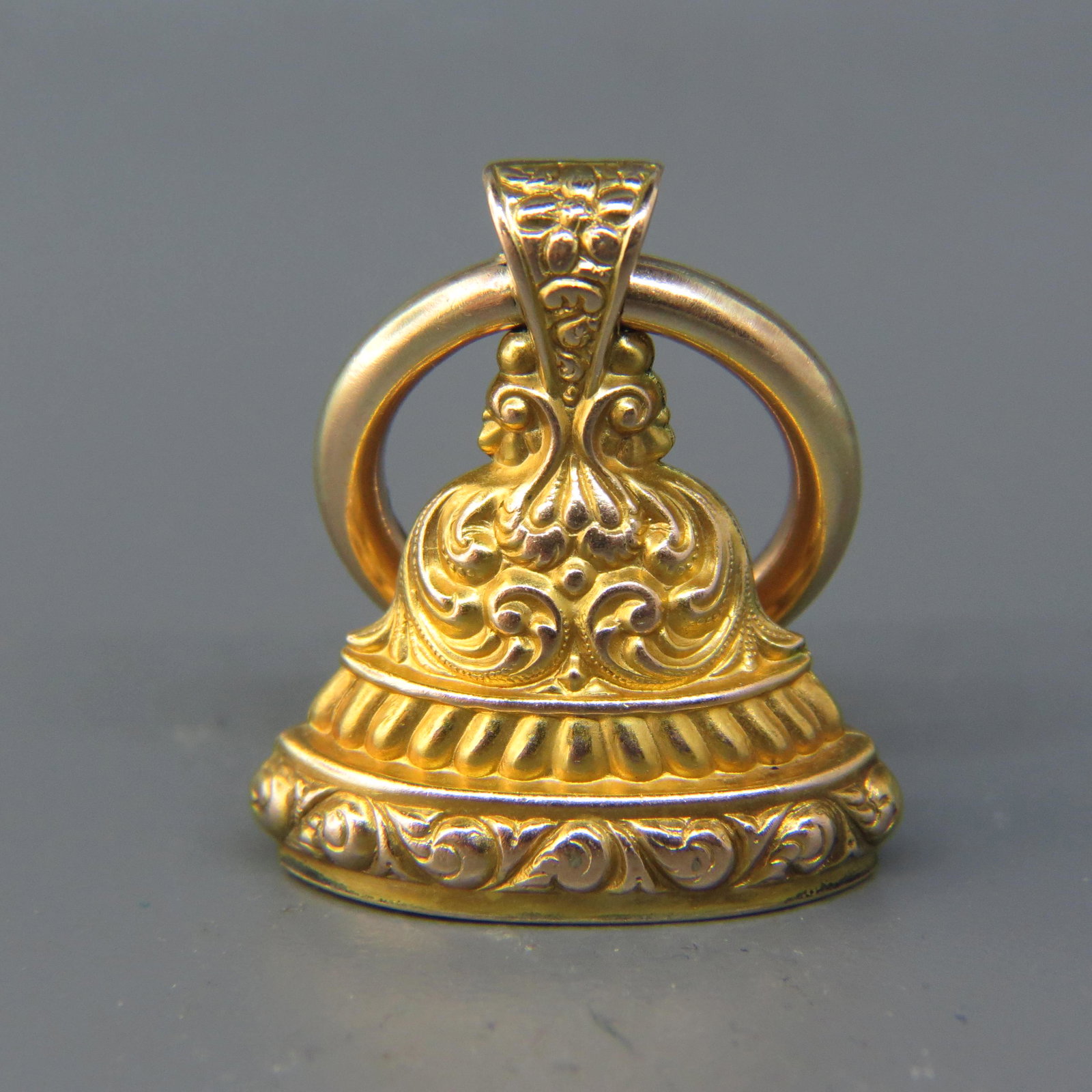 Antique 14K Gold Fob Charm: Fancy Victorian designs, 1 X 1 1/2" including the large hoop, monogram E.W.P., 5.5 grams.