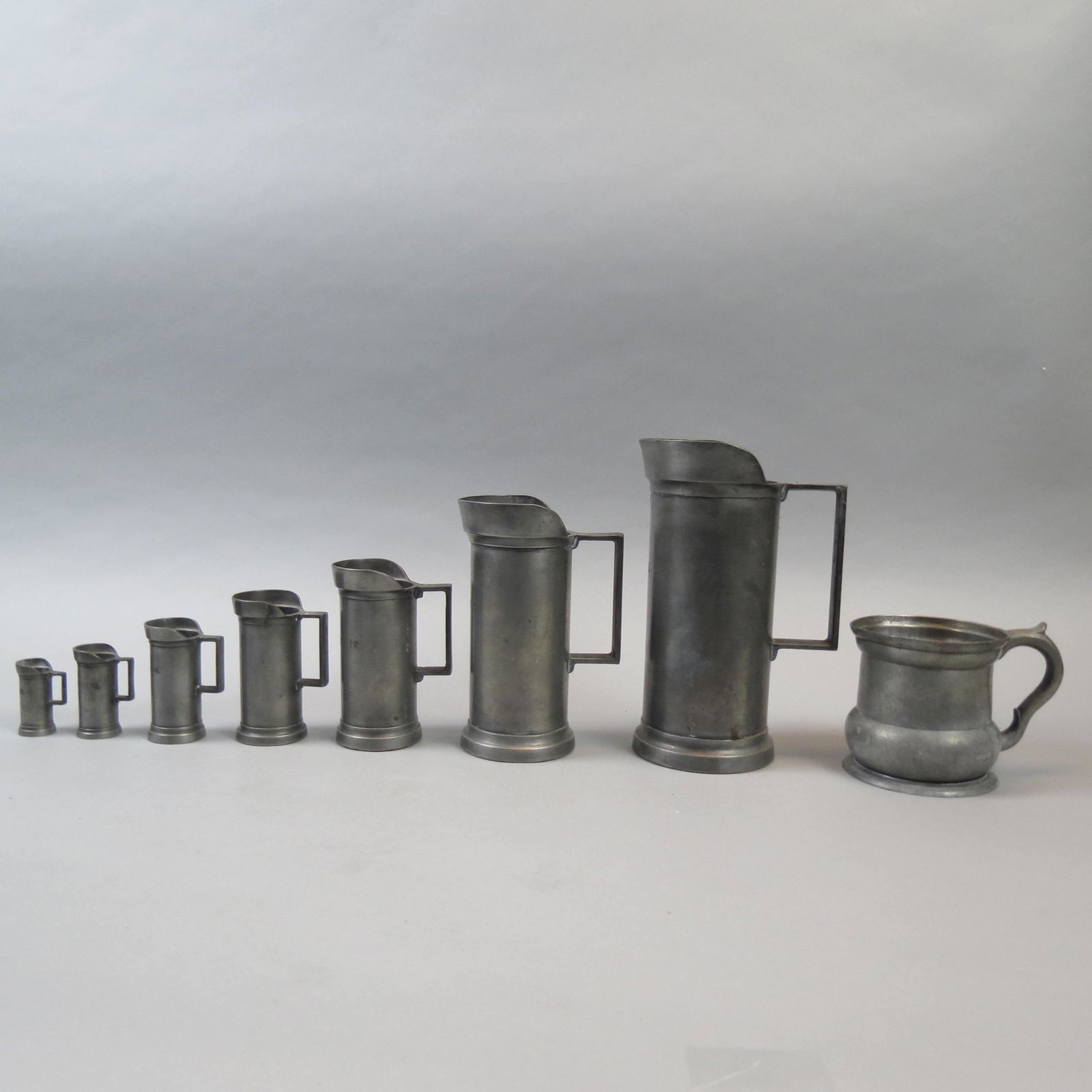 8 Early Pewter Measures (1 of 10)