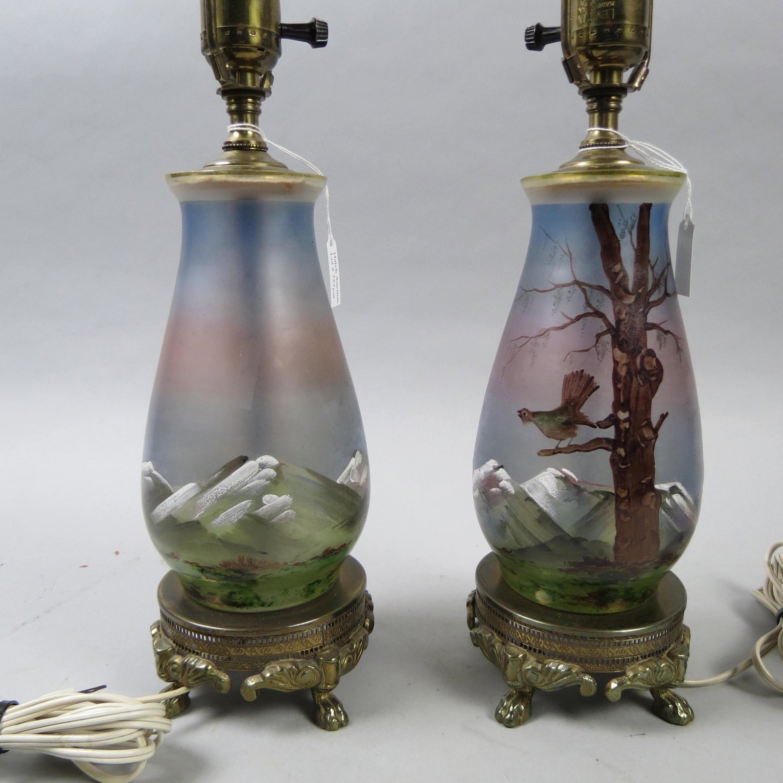 Pair of Enameled Art Glass Lamps: Landscapes with bird in tree, Legras style enamel decoration, bronzed footed base, 7 1/2 glass body.