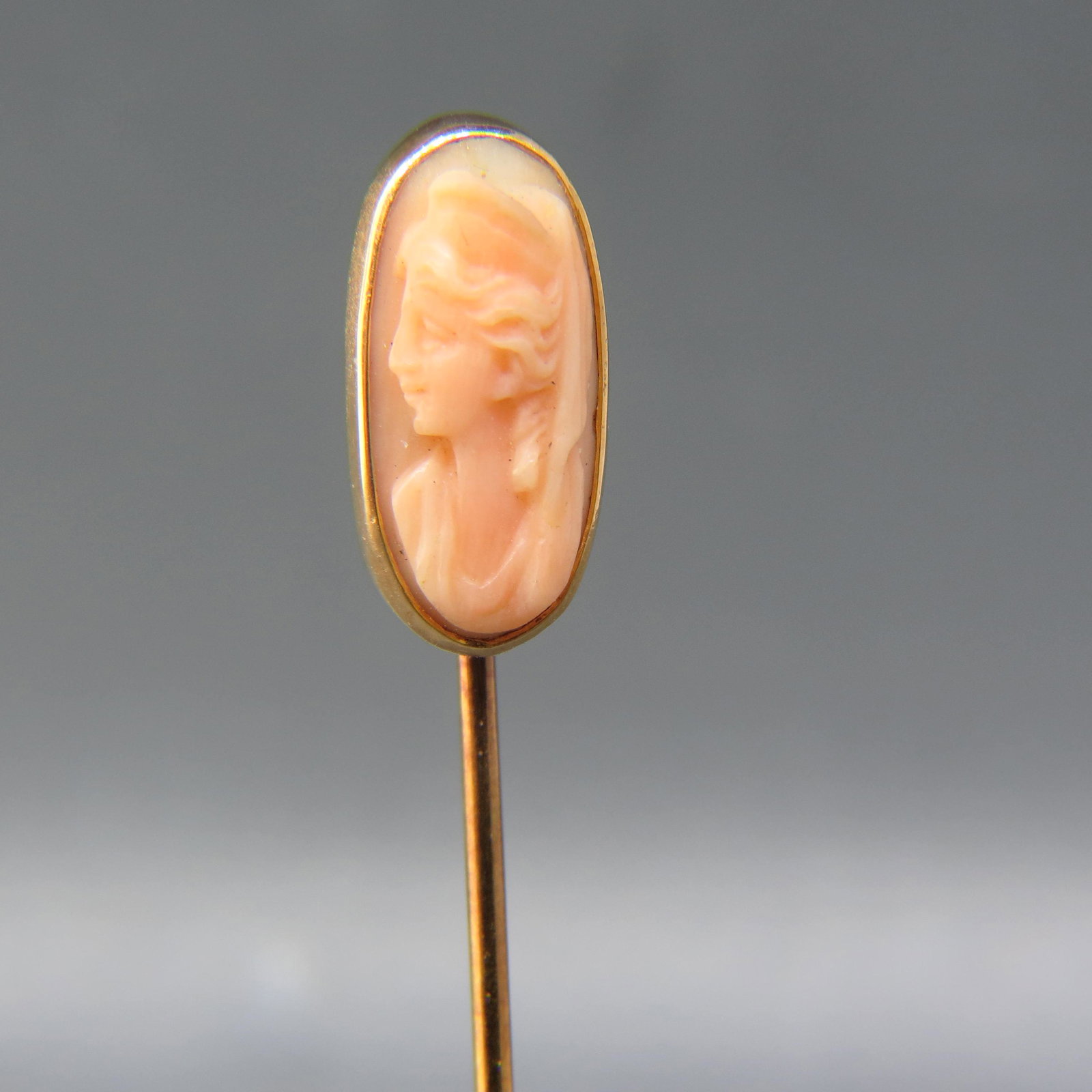 Cameo 14K Gold Stickpin: Carved coral oval portrait of a lady, fine pink coral in 14K yellow gold, 2 grams.