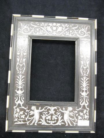 Victorian Inlaid Ivory & Ebony Picture: Frame, cherub, gryphon & vine decor, overall 8" x 11" and would hold a 4 3/8" x 6" image.