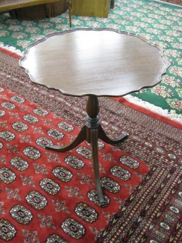 Mahogany Pie Crust Table,: Duncan Phyfe tri-footed base, 24" diameter, 27" tall.