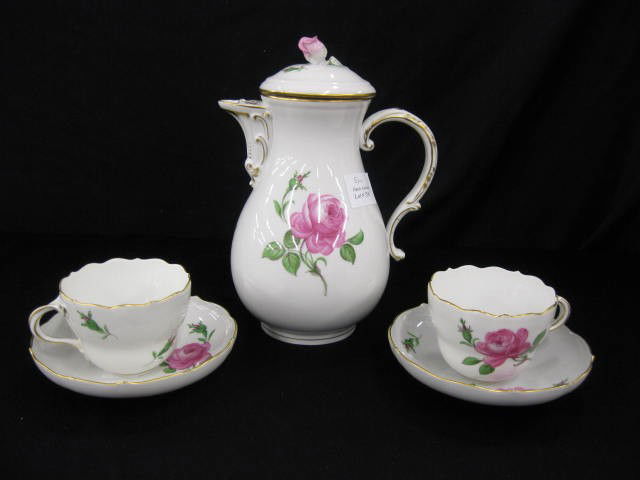 Meissen Porcelain Coffeepot with Two Cups,: & saucers, rose decor, crossed swords mark, 19th century.