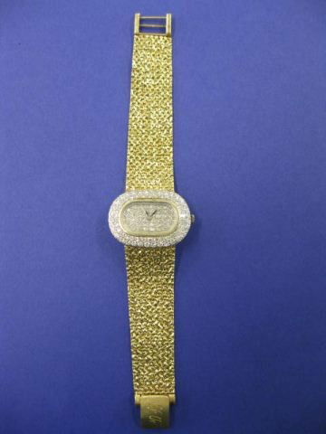 Mathey Tissot Diamond Wristwatch,: 104 diamonds totaling 4 carats, high grade, 14k yellow gold intergrated mesh band, 7 1/2" long, with appraisal of $11,000.00, total weight is a whopping 55 grams, diamonds are white and stunning! Hist