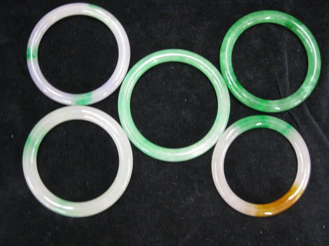 Lot of 5 Jade Bangle Bracelets,: mottled greens, lavendar & one with some brown, app approx. 2 1/8" to 2 1/4" opening.