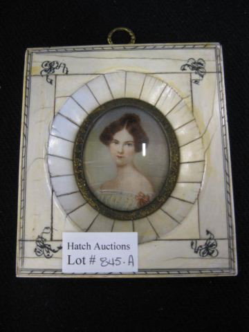 Miniature Portrait on Ivory of Young Woman,: 1 1/2" x 2" oval image, signed, in ivory frame.