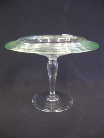 Steuben Art Glass Tall Compote,: light emerald threading on clear controlled bubble, 6 1/2" tall, 8" diameter, excellent. Frederick Carder (1863–1963), a gifted English designer, managed Steuben Glass Works from its founding in 190