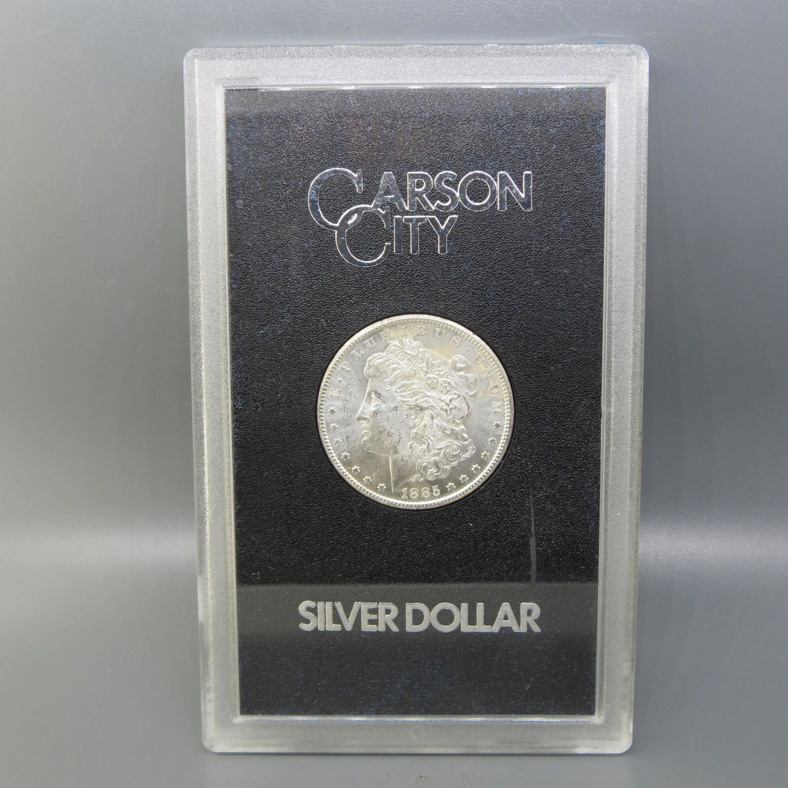 1885-CC Morgan Silver Dollar, GSA, uncirculated, (1 of 4)