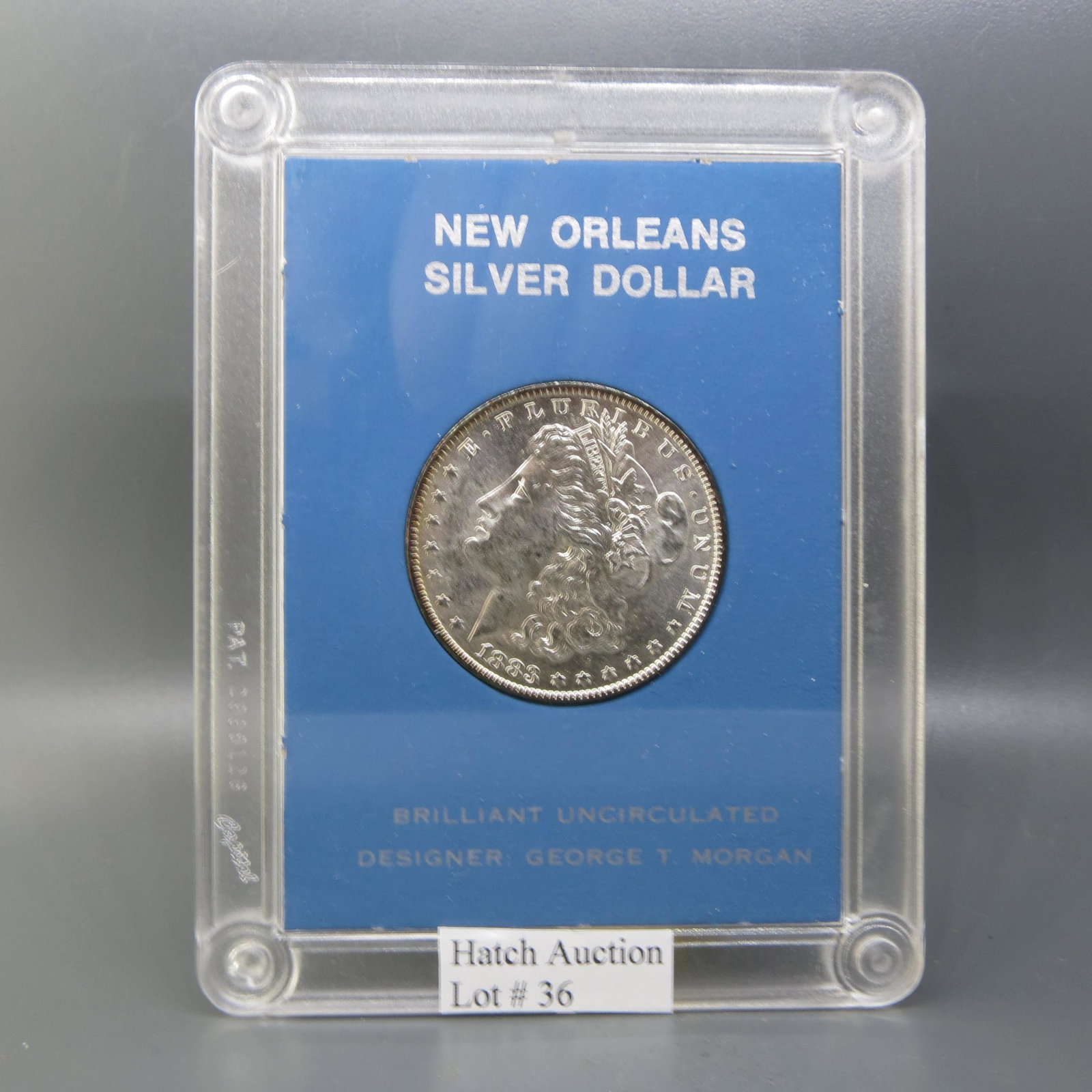 1883-O Morgan Silver Dollar, uncirculated,: in NMDC holder.