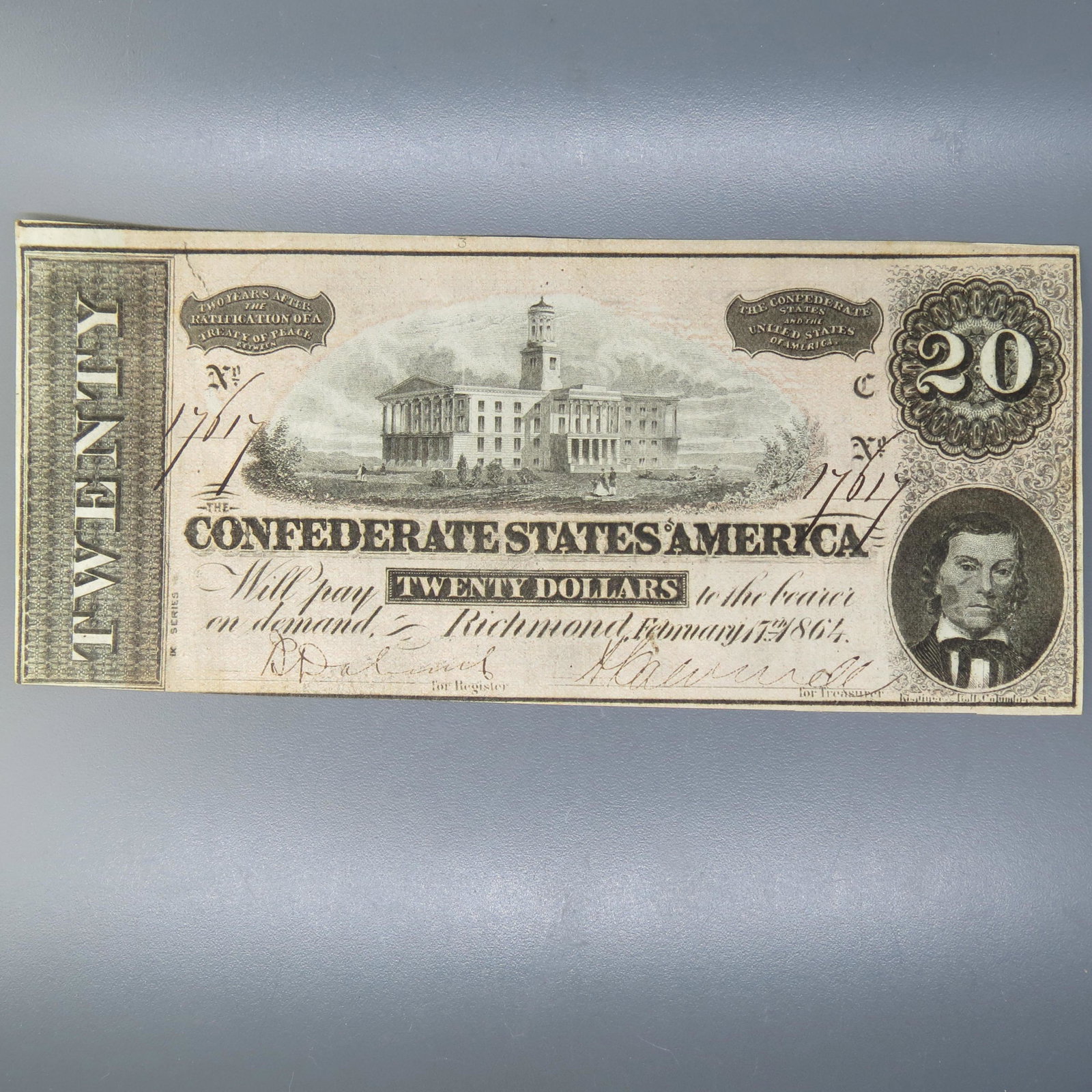 1864 $20.00 Confederate Note, Richmond, Virginia,: serial # 17617, February 17, 1864, state capitol in Nashville, Tennessee, Alexander Stephens to the right.